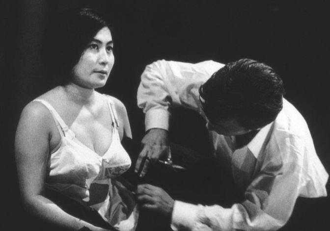 Yoko Ono, Cut Piece. 1964. Performed by Yoko Ono, Carnegie Recital Hall, New York_© Minoru Niizuma. Courtesy Lenono Photo Archive, New York