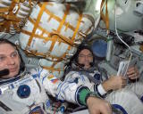 ISS-04_Yury_Onufriyenko_and_Carl_E._Walz_in_the_Soyuz_TM-33_spacecraft